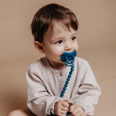 Siliconen fopspeenclip Colour Essence SUAVINEX hemelsblauw Siliconen fopspeenclip Colour Essence SUAVINEX hemelsblauw