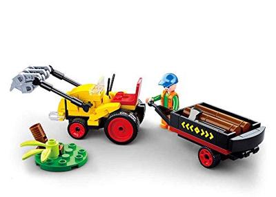 Sluban - traktor met boomstammen