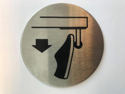 Symboolplaat voetopener ø75mm rvs mat
