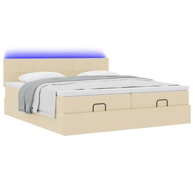 Ottoman bed met matrassen en LED's 180x200cm stof crèmekleurig