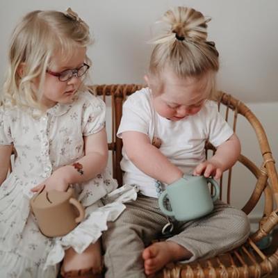 MUSHIE silicone snackbeker groen