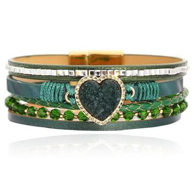 Deja Armband goudkleurig met hartvormige natuursteen in groen