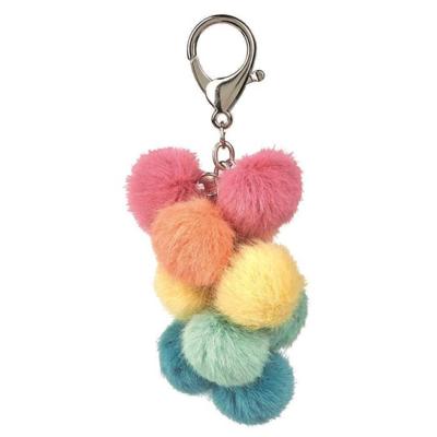 Moses sleutelhanger Happy me pluche pompons 11,5 cm Moses sleutelhanger Happy me pluche pompons 11,5 cm