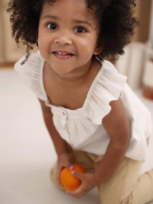 Babyblouse van katoenvoile vanille