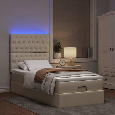 Ottoman bed met matras en LED's 120x200cm stof crèmekleurig