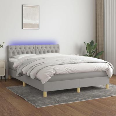 Boxspring met matras en LED stof lichtgrijs 140x200 cm