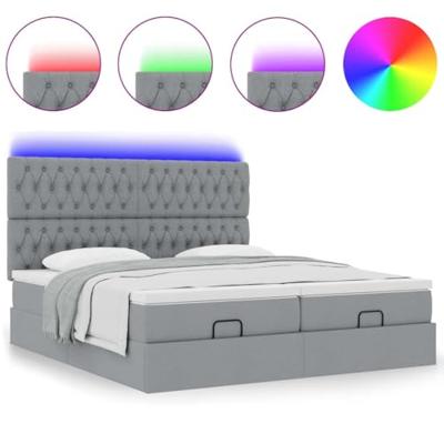 Ottoman bed met matrassen en LED's 200x200cm stof lichtgrijs