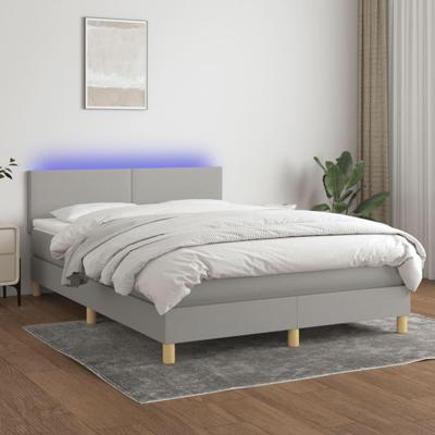 Boxspring met matras en LED stof lichtgrijs 140x200 cm