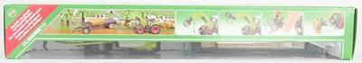 Siku 1946 Tractor met balen grijper en trailer voor ronde balen 1:50