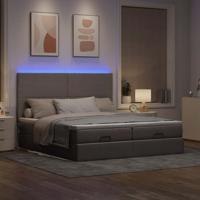 Ottoman bed met matrassen en LED's 180x200cm stof taupe - thumbnail