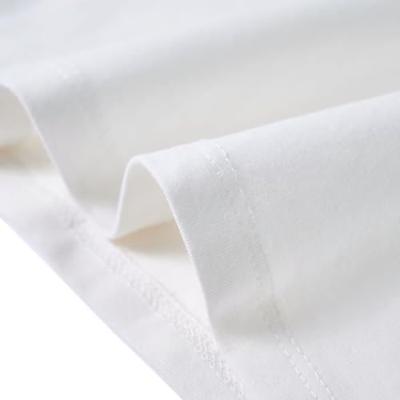 Kindershirt met ruches aan de mouwen glitterprint 116 ecru Kindershirt met ruches aan de mouwen glitterprint 116 ecru