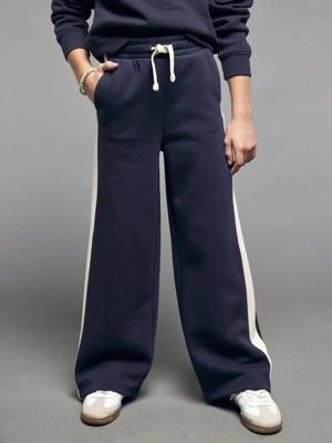 Joggingbroek met wijde pijpen voor meisjes met strepen aan de zijkant marineblauw