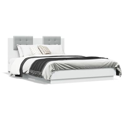Bedframe met hoofdeinde en LED-verlichting wit 140x190 cm