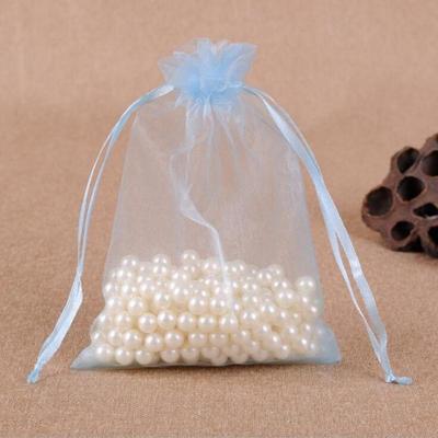 100 PCS geschenk zakken sieraden organza zakje bruiloft verjaardag partij drawable zakjes Gift Bag grootte: 7X9cm (licht blauw)