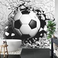 Fotobehang - Voetbal komt door de muur, zwart/wit, te koop in 11 maten, incl behanglijm - thumbnail