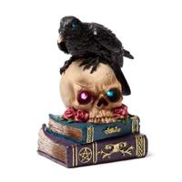 Crow Perched on LED Skull & Books - thumbnail
