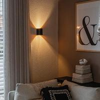 QAZQA Moderne wandlamp zwart met messing - Sabbio - thumbnail