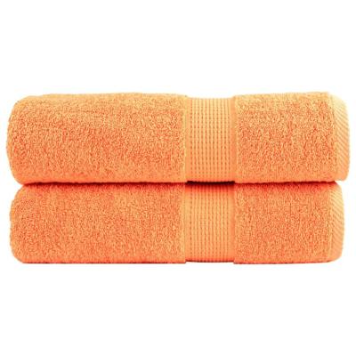 VidaXL Badhanddoeken solund 2 st 600 g/m² 70x140 cm oranje