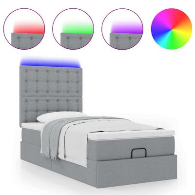 Ottoman bed met matras en LED's 180x200cm stof lichtgrijs