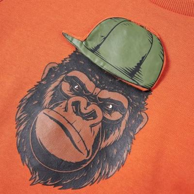 Kindertrui met gorillaprint 116 donkeroranje Kindertrui met gorillaprint 116 donkeroranje