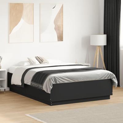 Bedframe met LED-verlichting bruin eikenkleurig 135x190 cm