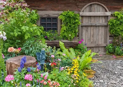 Alexsar Art Tuinschilderij bloemenschuur 70x50cm