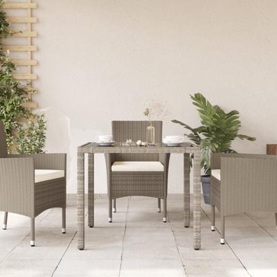Tuintafel met glazen blad 90x90x75 cm poly rattan lichtgrijs
