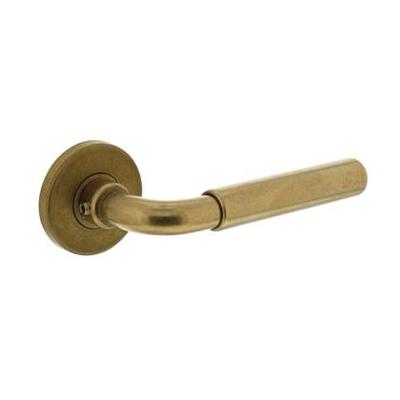 Deurkruk Palma met rozet ø49x7mm verdekt messing getrommeld