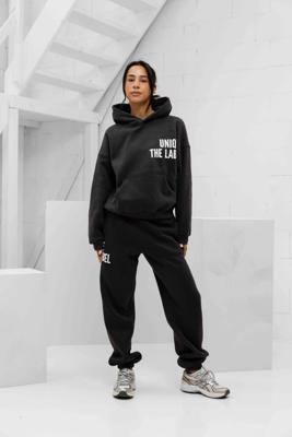 Unique The Label Elyana Trainingspak Dames Donkergrijs - Maat XS - Kleur: Donkergrijs | Soccerfanshop