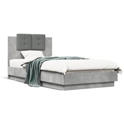 Bedframe met hoofdbord en LED-verlichting betongrijs 75x190 cm