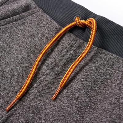 Kinderjoggingbroek 140 gemleerd donkergrijs Kinderjoggingbroek 140 gemleerd donkergrijs