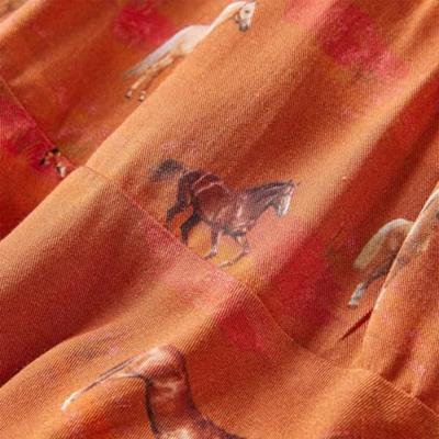 Kinderrokje met paardenprint 128 cognackleurig Kinderrokje met paardenprint 128 cognackleurig