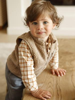 Mouwloos vestje baby in sherpa taupe