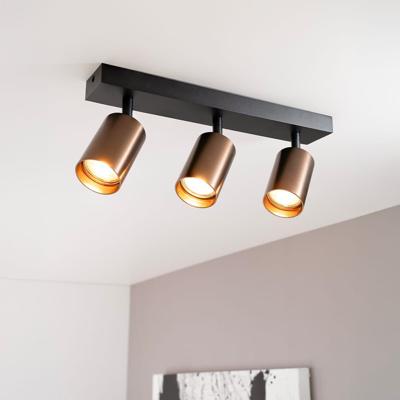 Taurus bronzo III by LUSENZ - 3-lichts plafondspot met kantelbare geborstelde bronzen spots en matzwarte basis Taurus bronzo III by LUSENZ - 3-lichts plafondspot met kantelbare geborstelde bronzen spots en matzwarte basis