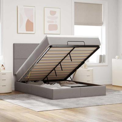 Ottoman bed met matras en LED's 140x190cm stof taupe