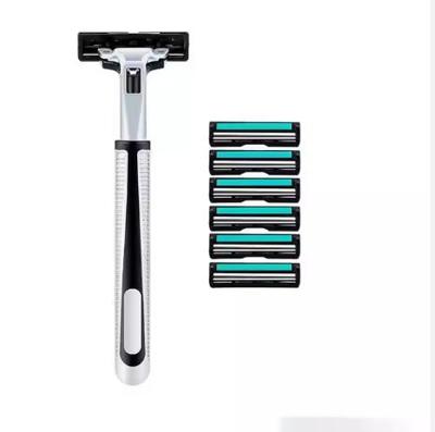 Huismerk Razor en 6 scheermesjes voor de Gillette Contour plus