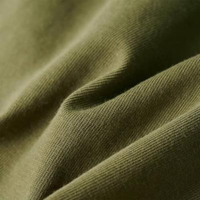 Kindershirt 104 kakikleurig