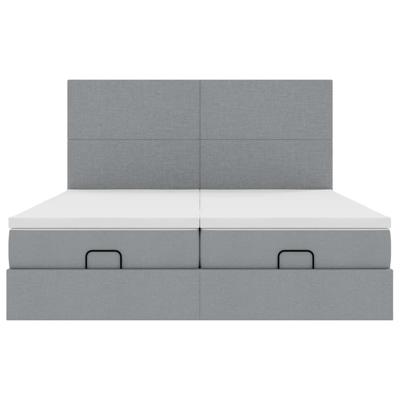 Ottoman bed met matrassen en LED's 180x200cm stof lichtgrijs