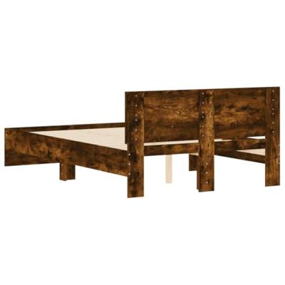 Bedframe met hoofdeinde gerookt eikenkleurig 135x190 cm