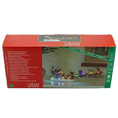 Kerstfiguur voor binnen - Kerstman in een slee met rendieren - 10 LEDs - 14 x 36 cm - Meerkleurig - Werkt op batterijen - Kerstverlichting Kerstfiguur voor binnen - Kerstman in een slee met rendieren - 10 LEDs - 14 x 36 cm - Meerkleurig - Werkt op batterijen - Kerstverlichting