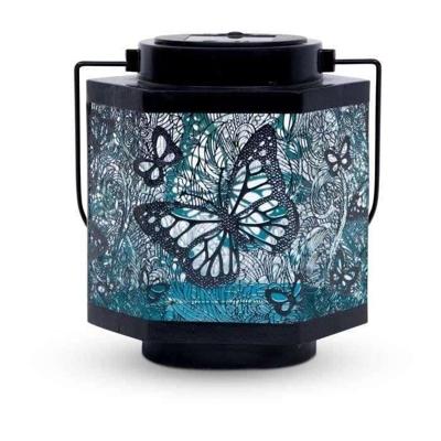 Lantaarn op zonne-energie - GARDEN ID Papillon - Ø13 h15 cm - Autonomie 8 uur - Schakelaar - Oplaadbare AAA-batterij. Lantaarn op zonne-energie - GARDEN ID Papillon - Ø13 h15 cm - Autonomie 8 uur - Schakelaar - Oplaadbare AAA-batterij.