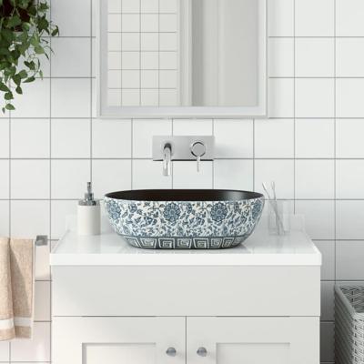 VidaXL Opzetwasbak ovaal 47x33x13 cm keramiek zwart en blauw VidaXL Opzetwasbak ovaal 47x33x13 cm keramiek zwart en blauw