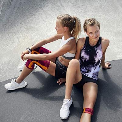 Bauerfeind Sports Knee Strap Patellabrace - M - Universeel - Roze Bauerfeind Sports Knee Strap Patellabrace - M - Universeel - Roze