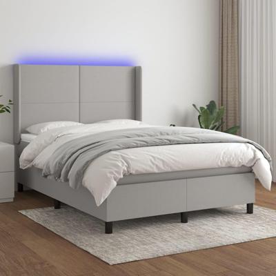 Boxspring met matras en LED stof lichtgrijs 140x190 cm