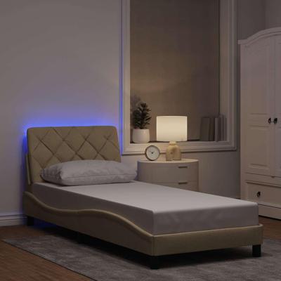 Bedframe met LED zonder matras 90x200 cm stof crèmekleurig