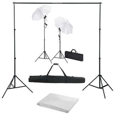 Fotostudioset met achtergrond, lampen en paraplu's
