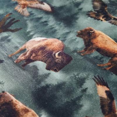 Kindertrui met runderen en adelaarsprint 116 donkergroen Kindertrui met runderen en adelaarsprint 116 donkergroen