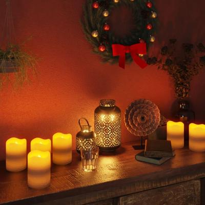 VidaXL Led-kaarsen 24 st vlamloos met afstandsbediening warmwit