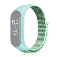 By Qubix - Nylon Geweven Bandje Compatible met Xiaomi Mi Band 3/4 / 5/6 / 7 - Mintgroen - Compatible Xiaomi bandje - thumbnail