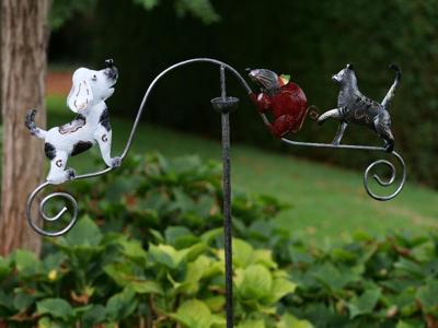 Balans Tuinsteker hond Kat vangt muis